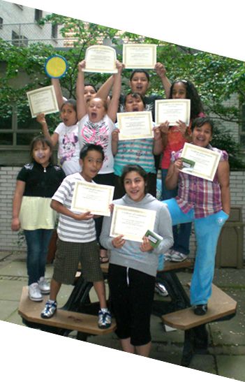 Kids with diplomas